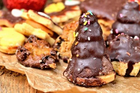 Close-up of christmas sweets with different types of candy on baking paper and 스톡 사진