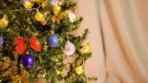 Close up on Christmas tree with blinking garlands Stock Footage 82952551