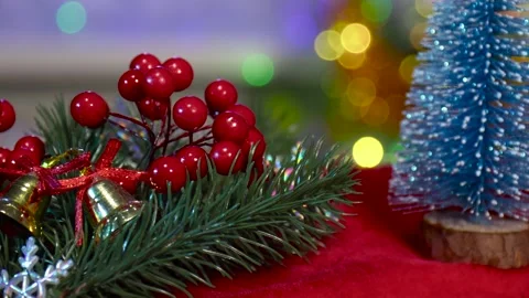 Close-up of Christmas tree branches with berries and a blue Christmas tree Stock Footage 260887966