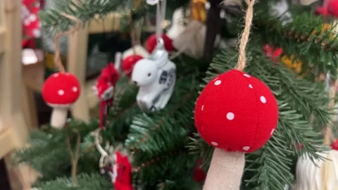 Close-up of Christmas tree branches decorated with colorful ornament Stock Footage 289619800