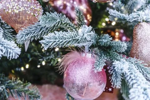 Close up of Christmas tree decorated by pink balloons Stock Photos