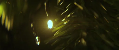 Close-up of Christmas tree electric string lights 5.7K scope video Stock Footage 323428517