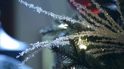 Close up of Christmas tree with lights and silver glitter. Stock Footage 100649769