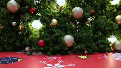 Close up a Christmas tree lights glittering at night. New Year fir tree with dec Stock Footage 145299961