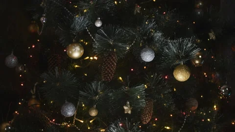 Close up a Christmas tree lights glittering at night. New Year fir tree with 動画素材 159539257