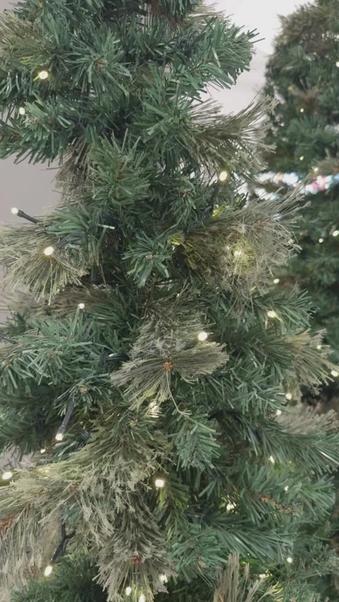 Close-Up of Christmas Tree With Warm Lights Stock Footage 323275354