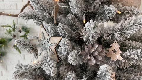 Close up Christmas White Tree with lights and decorations in beige and white Stock Footage 225515730