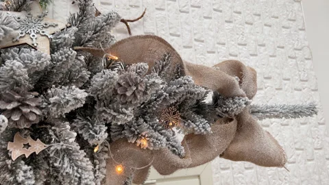 Close up Christmas White Tree with lights and decorations in beige and white Stock Footage 225516734