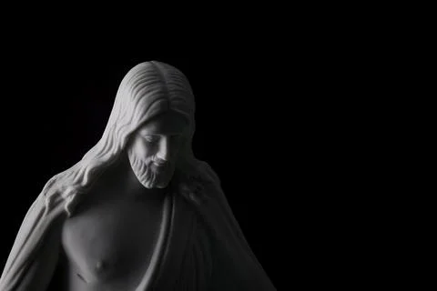 Close Up of Christus Statue With Dramatic Lighting Stock-Fotos