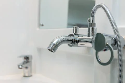 Close up of chrome bath shower tap Stock Photos