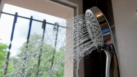 Close Up of Chrome Shower Head Spraying Water in Slow Motion Stock Footage 335267831