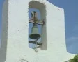 Close up on church bell and zoom out to rest of church SD Footage