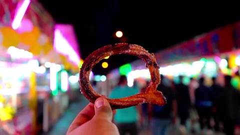 Close-up of a churro with sugar at the fair Stock Footage 295450712