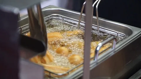 Close Up Of Churros Frying Stock-Footage 81723958
