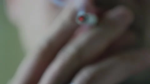 Close up of a cigarette being lightened by man Stock Footage 51680203