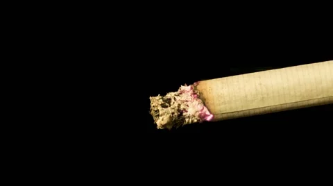 CLOSE UP OF CIGARETTE BEING SMOKED. Slow Motion Stock Footage 41207082