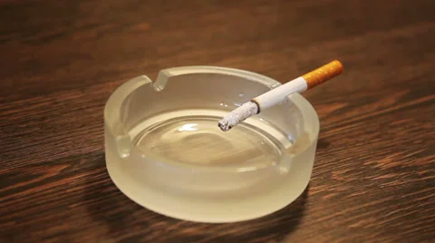 Close up with a cigarette falling Stock Footage 34254178