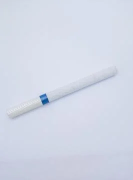 Close-up of a cigarette isolated on white background Stock Photos