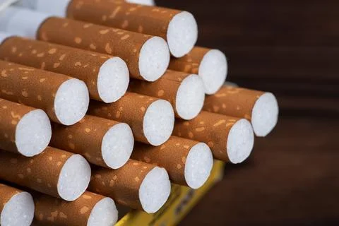 Close up cigarette in pack is addictive to be cancer. smoking reduction cam.. 스톡 사진