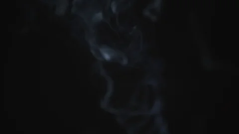 Close up of cigarette smoke drifting. Stock Footage 108405757