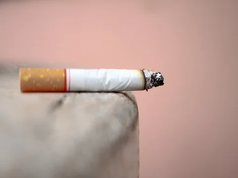 Close up cigarette on table. Stock-Footage 78602206