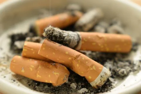 Close up of cigarettes in the ashtray Stock Photos