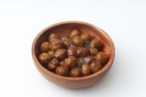 A close up of cilok. Made from tapioca flour and a delicious peanut sauce. .. Stock Photos