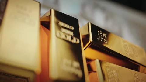 Close up cinematic view of gold bars as symbol of wealth and prosperity rot.. Stock Footage 337445894