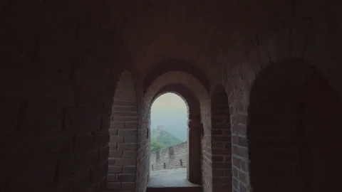 Close Up: Cinematic View Of A Stone Arched Doorway Offering A View Of Great Wall Stock Footage 139989603