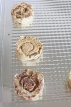 Close up of cinnamon rolls placed on a cooking sheet Stock Photos