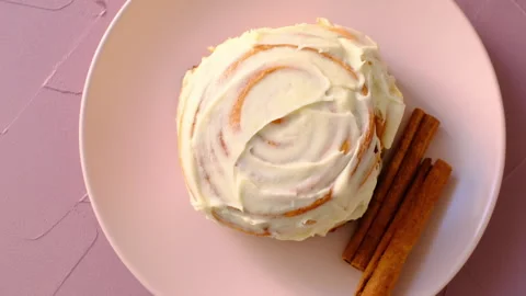 Close-up cinnamon rolls in sunlight Stock Footage 276270793