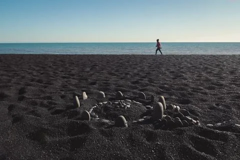 Close up circle with pebbles on beach concept photo Stock Photos