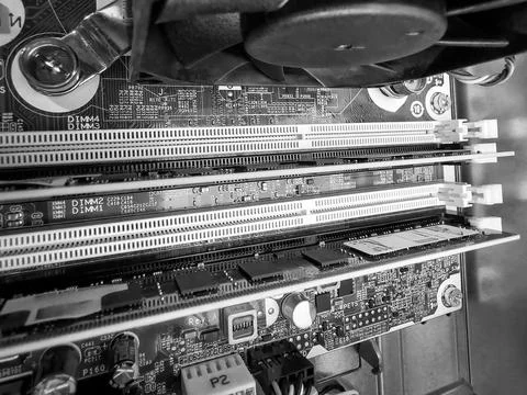Close up of circuit board with microchips and other computer parts. RAM mem.. Stockfoto's