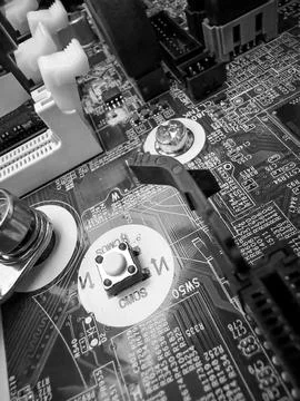 Close up of circuit board with microchips and other computer parts. Cables .. Stockfoto's