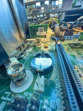 Close up of circuit board with microchips and other computer parts Foto stock