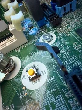 Close up of circuit board with microchips and other computer parts. Cables .. 库存照片