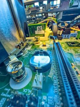 Close up of circuit board with microchips and other computer parts Foto stock