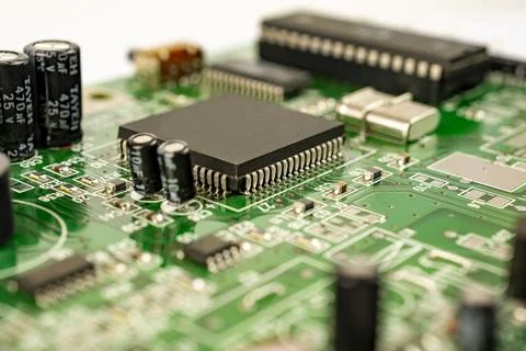 Close-up of a circuit board with microcircuits from an electrical appliance o Stock Photos