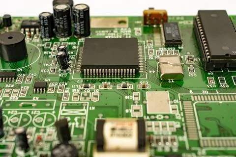 Close-up of a circuit board with microcircuits from an electrical appliance o Stock Photos
