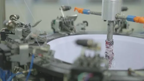 Close-up of Circular Knitting Loom Processing White Thread for Textile Industry Видео 336711267