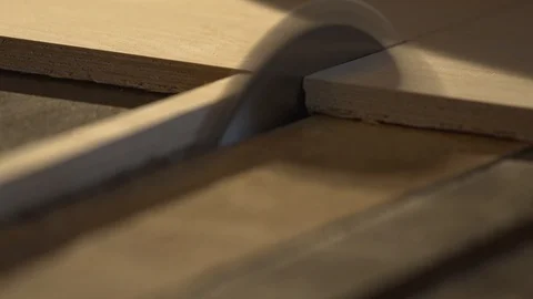Close-up. Circular saw sawing board. Carpentry workshop. Видео 107611980