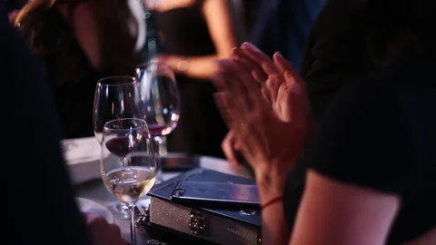 Close-up of clapping hands of impressed people attending an impressing event Stock Footage 73795275
