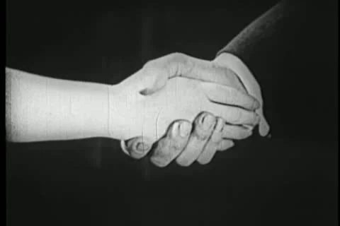 Close-up of clasped hands Stock Footage 11351924