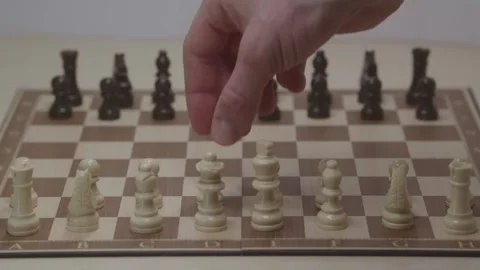 Close-up of a classic chess game being played on a wooden board. Stock Footage 327208927