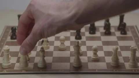 Close-up of a classic chess game being played on a wooden board. Stock Footage 327208992