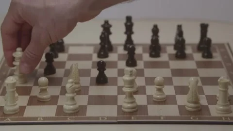 Close-up of a classic chess game being played on a wooden board. Stock Footage 327208995