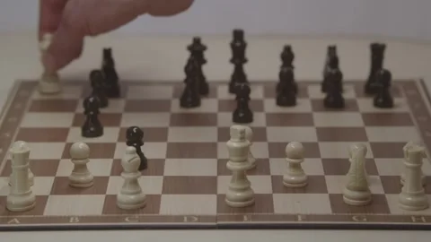 Close-up of a classic chess game being played on a wooden board. Stock Footage 327209008