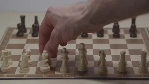 Close-up of a classic chess game being played on a wooden board. Stock Footage 327209055
