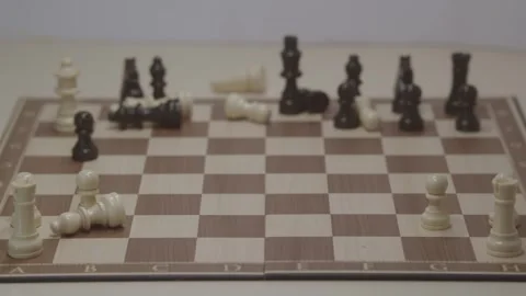Close-up of a classic chess game being played on a wooden board. Stock Footage 327209074