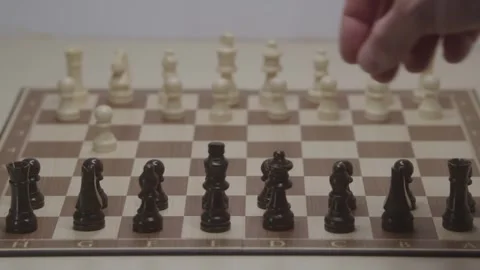 Close-up of a classic chess game being played on a wooden board. Stock Footage 327209084